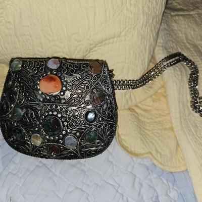 Small silver toned and bejeweled bag