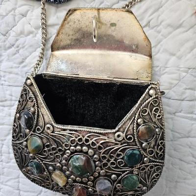 Small silver toned and bejeweled bag