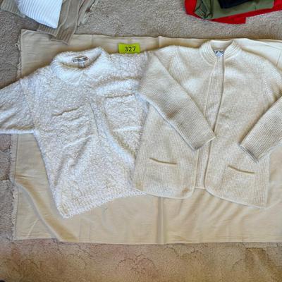 Two white sweaters