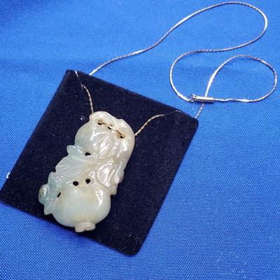 Pale jade Medallion on gold tone chain