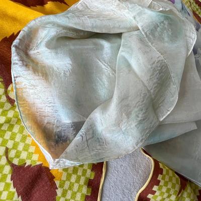 Lot of nature colored scarves