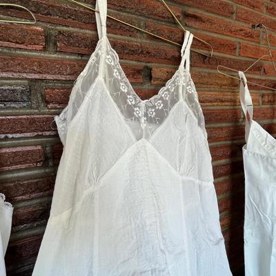 4 vintage slips.