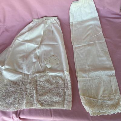 2 white skirt slips