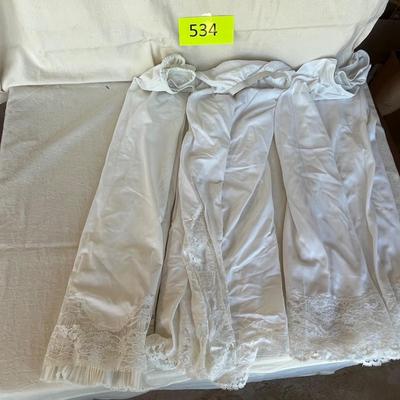 3 white skirt slips