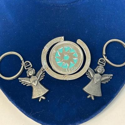 Pair of Guardian Angel Keychains and a Jafra Logo Purse Holder Hook