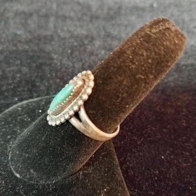 SIGNED STERLING SILVER AND TURQUOISE RING