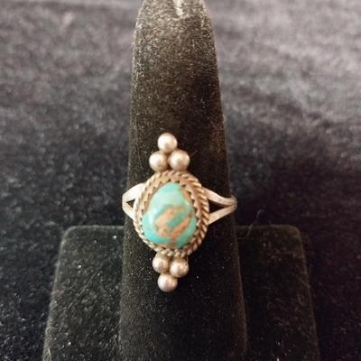 STERLING RING WITH A TURQUOISE STONE