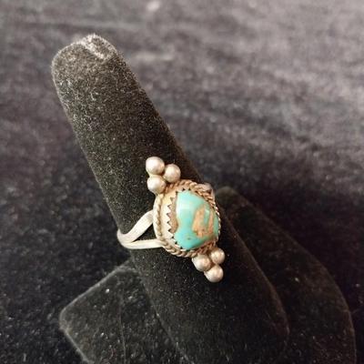 STERLING RING WITH A TURQUOISE STONE