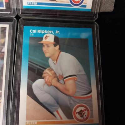 PETE ROSE AND OTHER BASEBALL CARDS IN PROTECTIVE SLEEVES