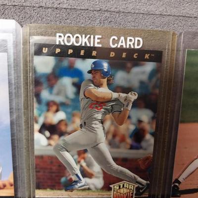 ROOKIE, PETE ROSE AND OTHER BASEBALL CARDS IN PROTECTIVE SLEEVES
