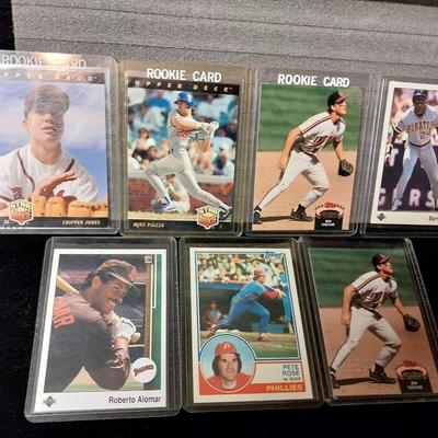 ROOKIE, PETE ROSE AND OTHER BASEBALL CARDS IN PROTECTIVE SLEEVES