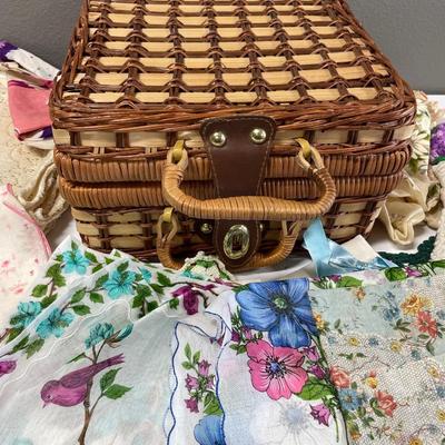 Wicker basket with hankies and more
