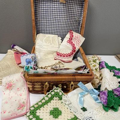 Wicker basket with hankies and more