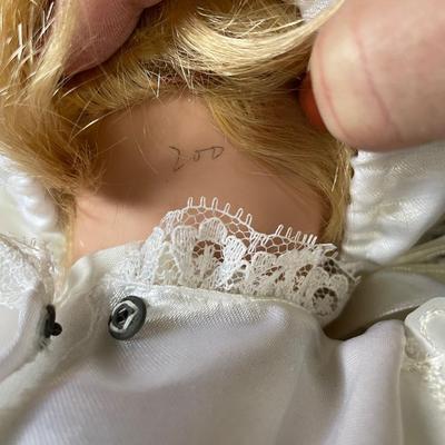 Doll in white dress