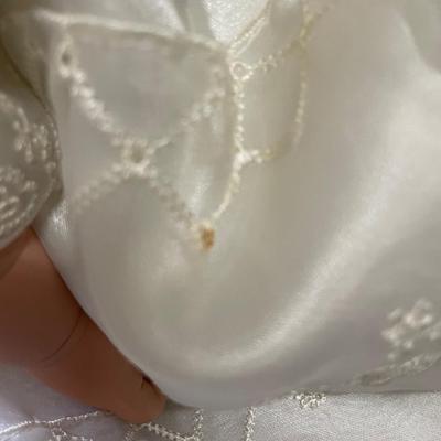 Doll in white dress