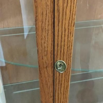 Locking Potbelly Curio Cabinet with Key