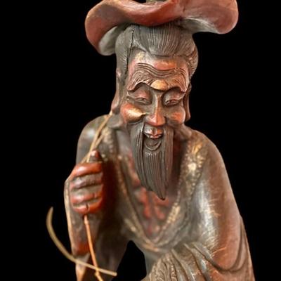 Intricately Hand Carved Wooden Asian Fisherman