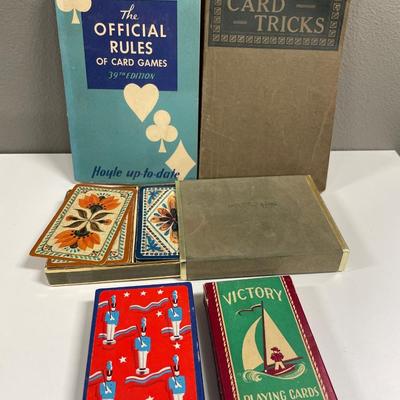 Vintage playing cards and books