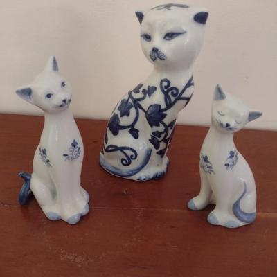 Set of Three Blue and White Ceramic Cat Statuettes