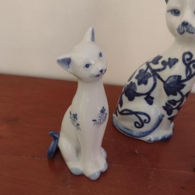 Set of Three Blue and White Ceramic Cat Statuettes