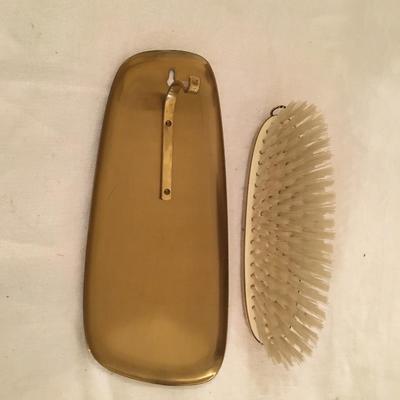 Wall hanging dish and brush