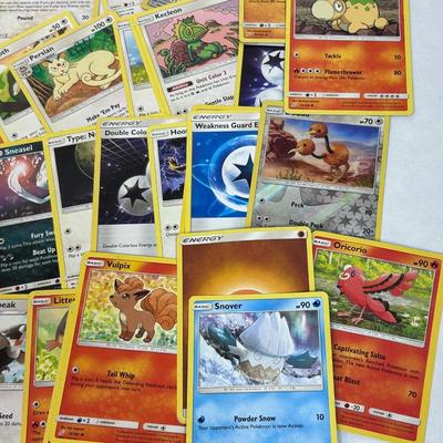 Mixed Lot of Loose POKEMON Card with Bonus Card Sleeves