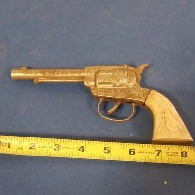 LOT 136 OLD LONE RIDER CAP GUN