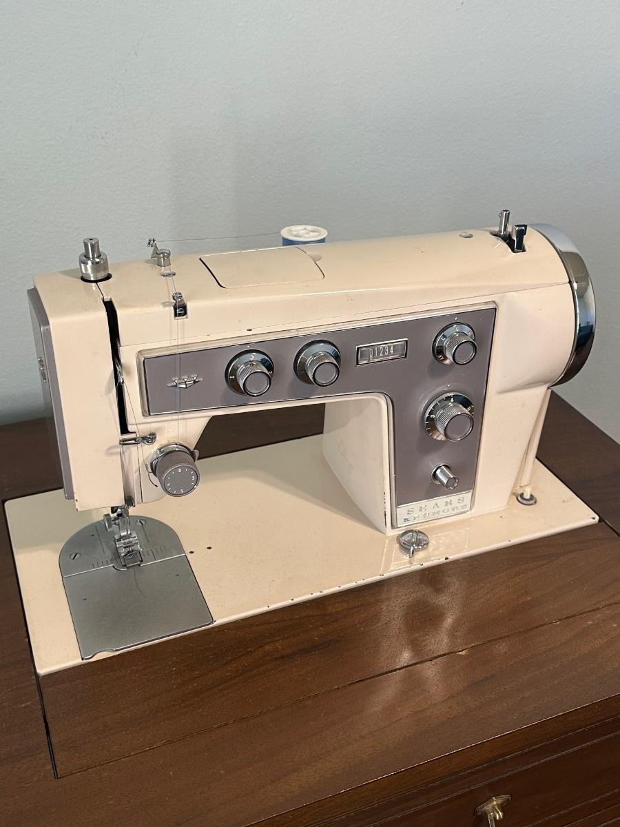 Sewing machine (Kenmore) with lots deals of extras