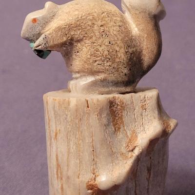 Carves Horn Squirrel on a Tree Stump