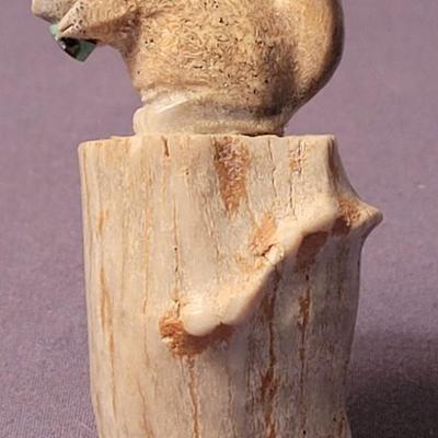 Carves Horn Squirrel on a Tree Stump