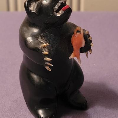 Bear holding a Fish