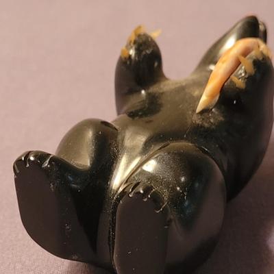 Bear holding a Fish