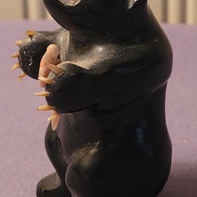 Bear holding a Fish