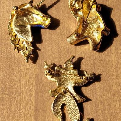 Unicorn, Bear, and Clown Brooches