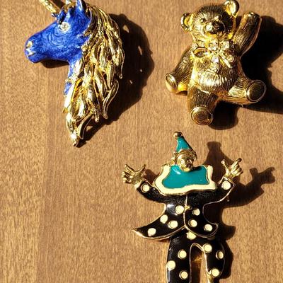 Unicorn, Bear, and Clown Brooches