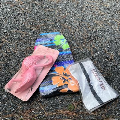 G1940 Lot of Two Yard Pink Flamingo Decorations, New Life Jackets Bag and New Boogie Board