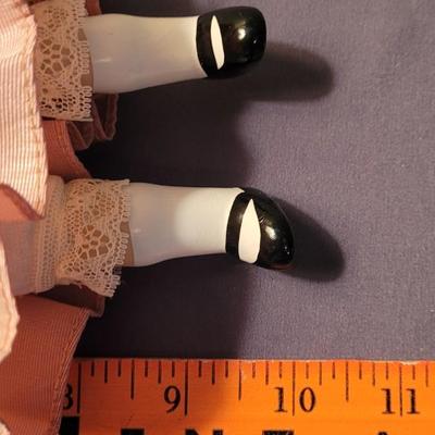Vintage Porcelain Doll with Pink Dress