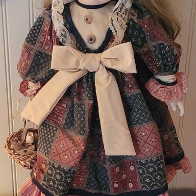 Vintage Porcelain Doll with Straw Hat and Basket