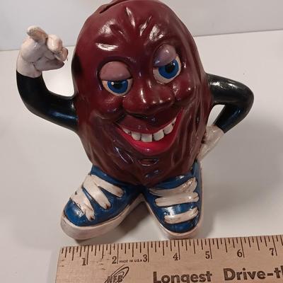 California Rasins ceramic piggy bank and Sun maid Rasins 1987 CALRAB Will Vinton bank