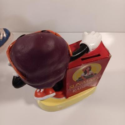California Rasins ceramic piggy bank and Sun maid Rasins 1987 CALRAB Will Vinton bank