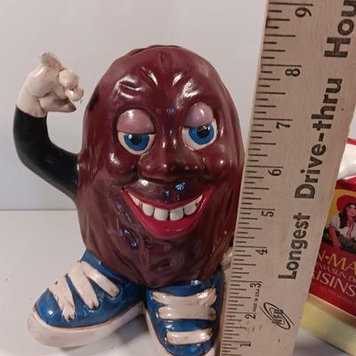 California Rasins ceramic piggy bank and Sun maid Rasins 1987 CALRAB Will Vinton bank