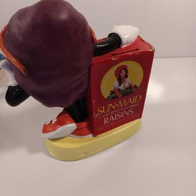 California Rasins ceramic piggy bank and Sun maid Rasins 1987 CALRAB Will Vinton bank