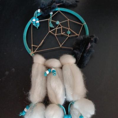 Howling wolf in pottery planter with Faux greenery / Cactus and a dream catcher