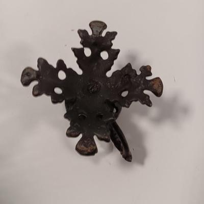 Cast Iron candle sconces with three vintage Cast Iron Triple Heart Kitchen utensils.