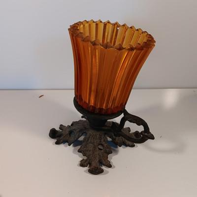 Cast Iron candle sconces with three vintage Cast Iron Triple Heart Kitchen utensils.