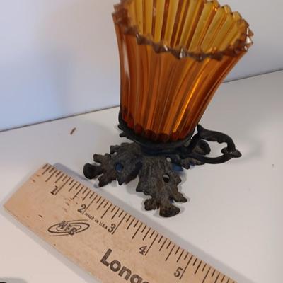 Cast Iron candle sconces with three vintage Cast Iron Triple Heart Kitchen utensils.