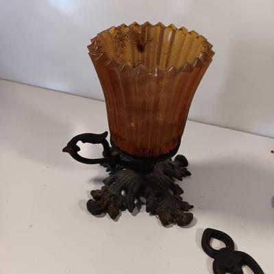 Cast Iron candle sconces with three vintage Cast Iron Triple Heart Kitchen utensils.