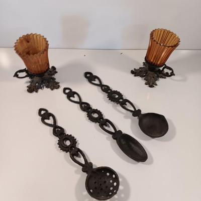 Cast Iron candle sconces with three vintage Cast Iron Triple Heart Kitchen utensils.