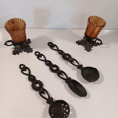Cast Iron candle sconces with three vintage Cast Iron Triple Heart Kitchen utensils.