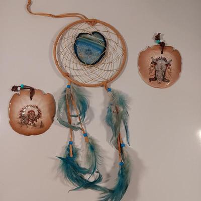 Two hand painted Native American Sand dollars with a dreamcatcher with blue Agate in center
